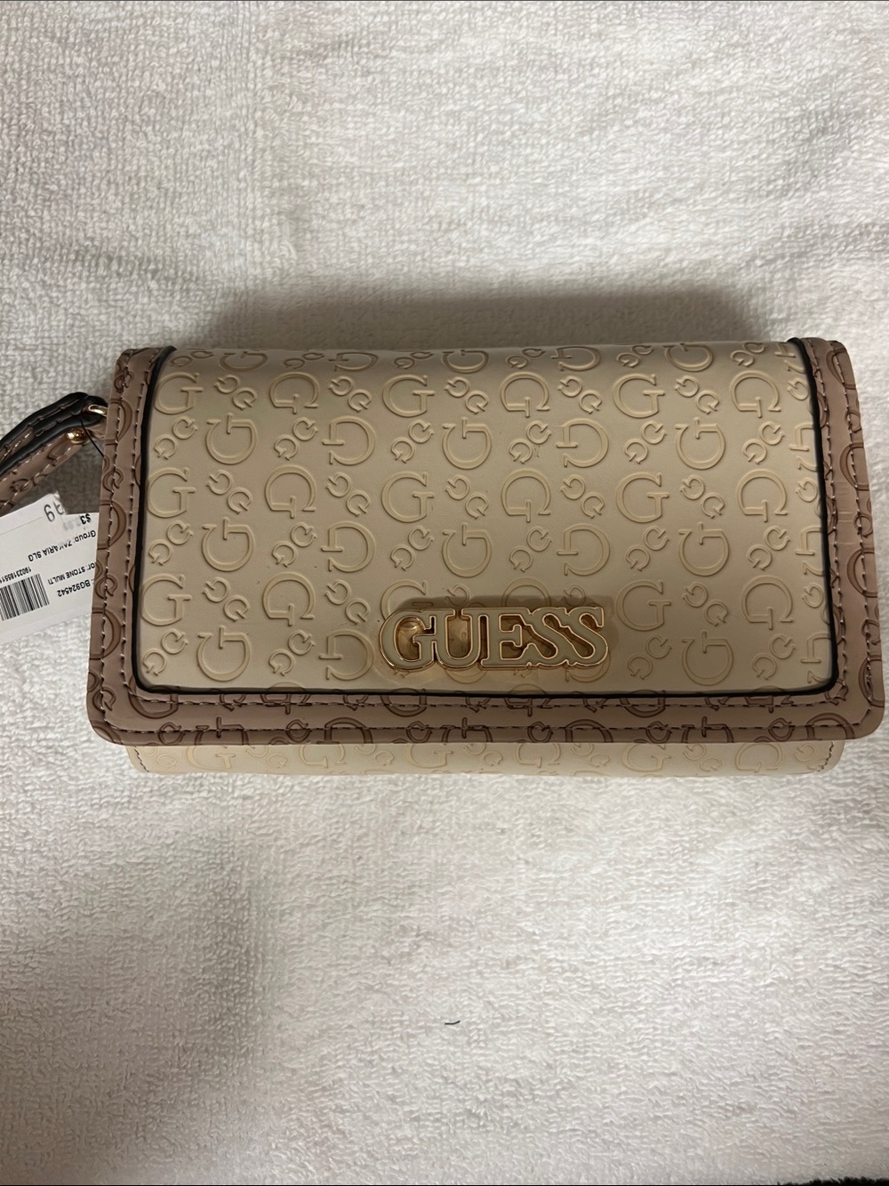 GUESS Cream Logo Embossed Crossbody Bag with Tan Trim